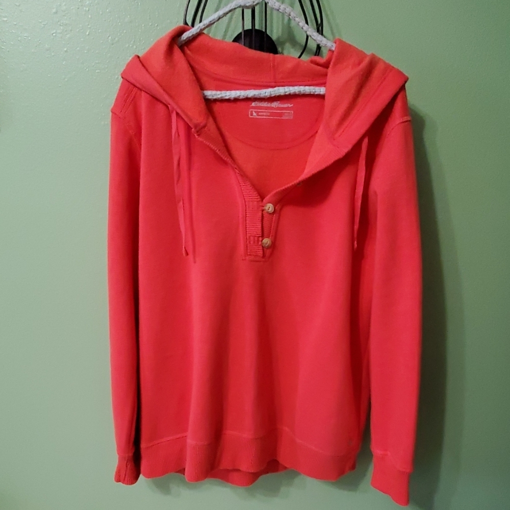 Hooded sweatshirt button in front.